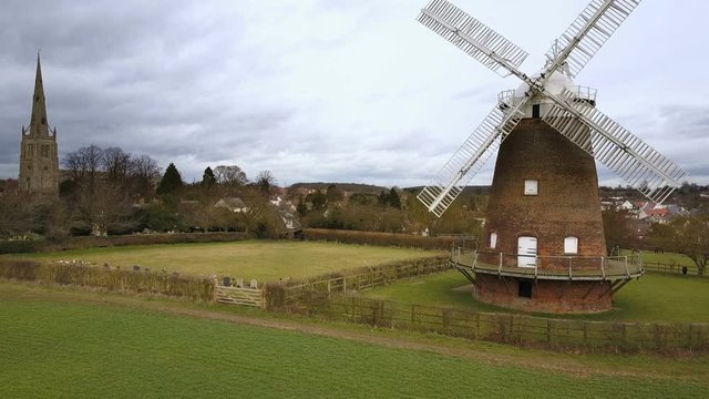 Thaxted village and windmill, Essex, England; aerial drone reveal