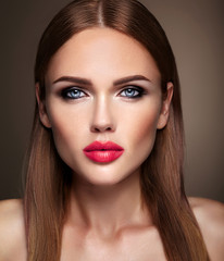 Fototapeta premium Portrait of beautiful girl model with evening makeup and romantic hairstyle. Pink lips