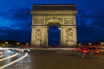 View of arc de triomphe during the twilight and long exposure image with light trails