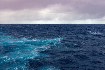 Clouds, waves and ship trace in Pacific