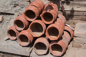 Ceramic pots stacked for sale at market