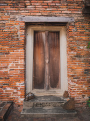Ancient door and wall of temple (Generality in Thailand,any kind of art decorated in Buddhist church)