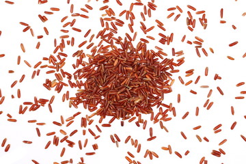 Red wild rice pile isolated on white background, top view