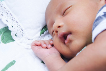 Asian Baby Sleeping Peacefully , Close Up