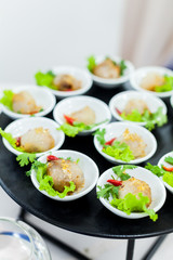 Thai Traditional Dessert, Tapioca balls with pork filling serve with vegetable.