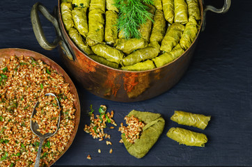 Middle-Eastern Food, Arabian cuisine, Stuffed vine leaves, or traditional Dolma.Top view, close up.