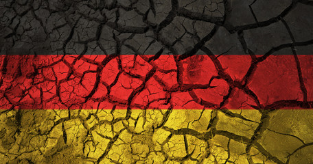 german flag on cracked ground background