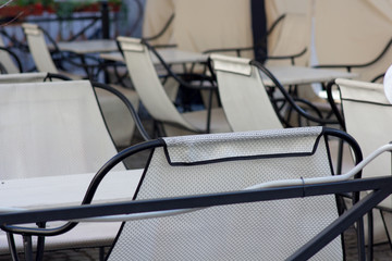 empty tables on the street