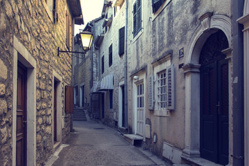 Old town narrow street and ancient houses. Herceg Novi, Montenegro.