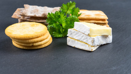 Dry cracker cookies with black background