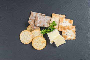 Dry cracker cookies with black background