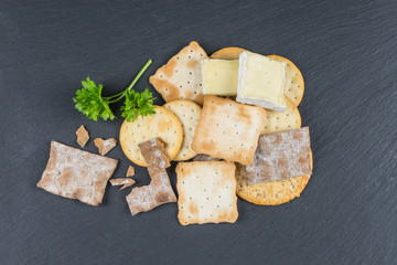Dry cracker cookies with black background