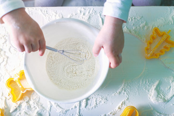 process of preparing doing flour children hands