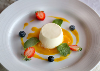 Photo of delicious orange panacotta