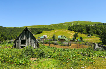 Wooden houses and households on the mountain