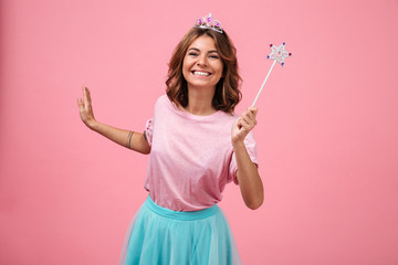 Portrait of a happy smiling girl dressed in fairy costume