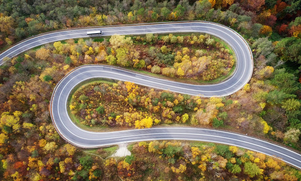 Road in autumn scenery - aerial shot
