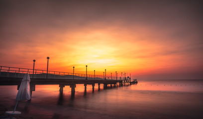 Fototapeta na wymiar Pier in the sunrise