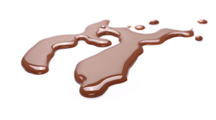 Spilled chocolate milk puddle isolated on white background