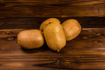 Kiwi fruits on wooden table