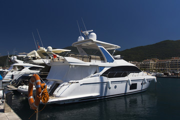 Luxury yacht in Porto Montenegro, prestigious shopping village and yacht port