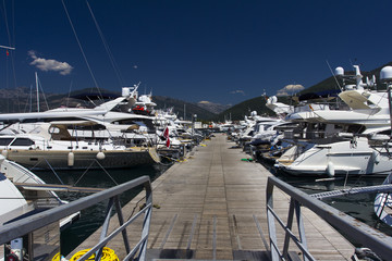 Luxury yachts in Porto Montenegro, prestigious shopping village and yacht port