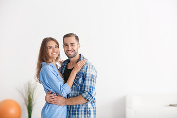Fototapeta premium Young happy couple at new home