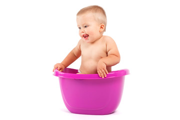 baby boy in purple tub