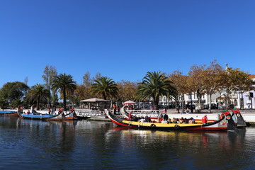  A canal with colorful boats in Aveiro, Portugal
