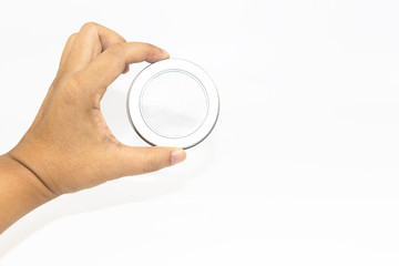 Hand's man holding transparent of metalic round lid