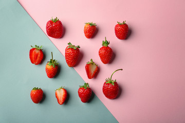 Fresh strawberries on color background