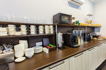 Breakfast buffet in the  modern hotel (motel) or hostel during a self service .