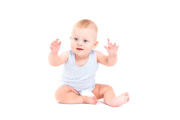 cute joyful baby boy in blue shirt and diaper