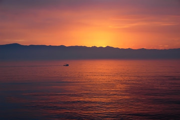 Lone Boat in the Sunset off Ensenada Mexico