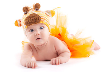 beauty little boy in orange skirt and deer costume