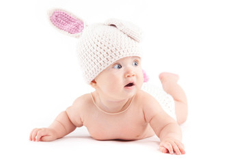 cute cheerful baby boy in rabbit costume