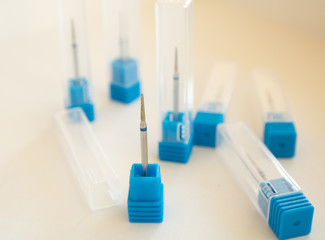 Burs for podiatry, diamond nail drill bits needle form. Medical instrument.