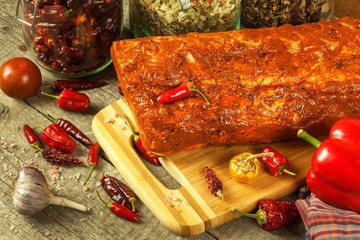 Marinated pork chop. Chilli sauce. Preparation for grilling. Fresh pork.