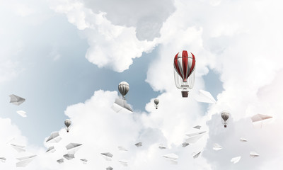 Flying hot air balloons in the air.