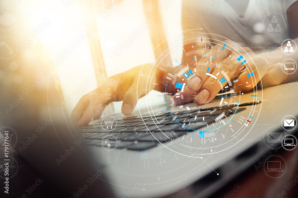 Poster businessman hand working with modern laptop computer in modern office with virtual icon diagram