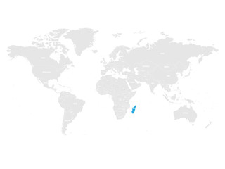 Madagascar marked by blue in grey World political map. Vector illustration.