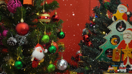 Greeting Season concept.Santa Claus show 3 days till Xmas with ornaments on a Christmas tree with...