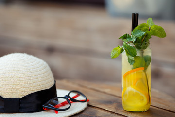 cocktail with melon, lemon and mint