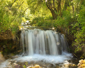 Fototapeta na wymiar Summer Tranquil Waterfall