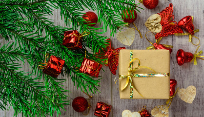 Fototapeta na wymiar Christmas festive card with fir branches and festive decor