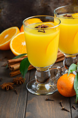 Fall Winter Cocktail Hot Spicy Orange Punch with Cinnamon Anise and Cloves Selective Focus