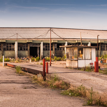 Abandoned factory against sky