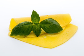 Cheese slices on the white background.