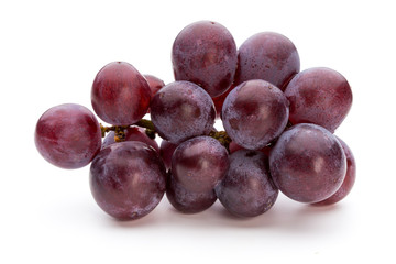 Ripe red grape isolated on white.