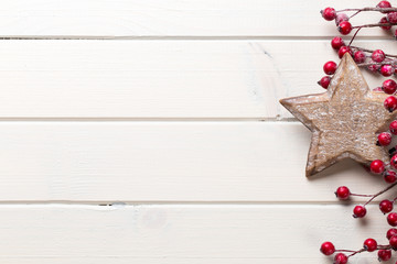 Christmas decor on the wooden white background.